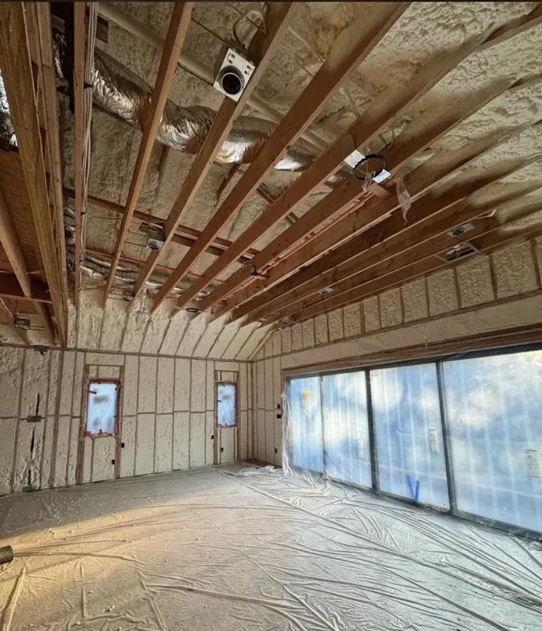 Interior walls and ceiling insulated with spray foam during new construction in Magalia